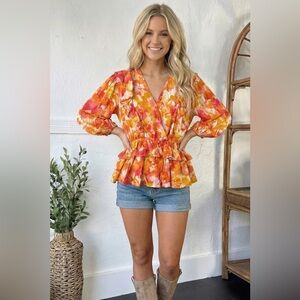 Tiered Peplum V-Neck Blouse in Orange-Pink Floral